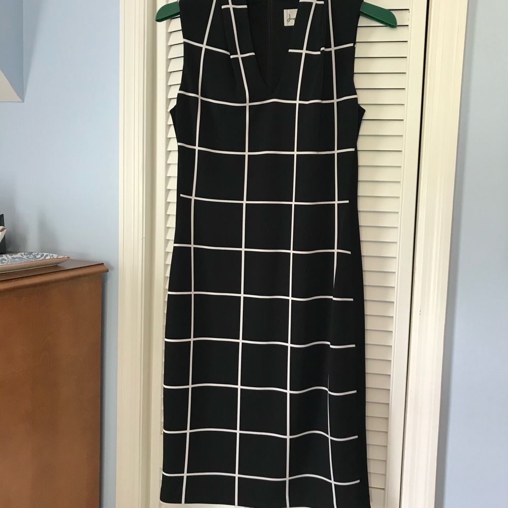 Joseph Ribkoff black lined sleeveless dress.